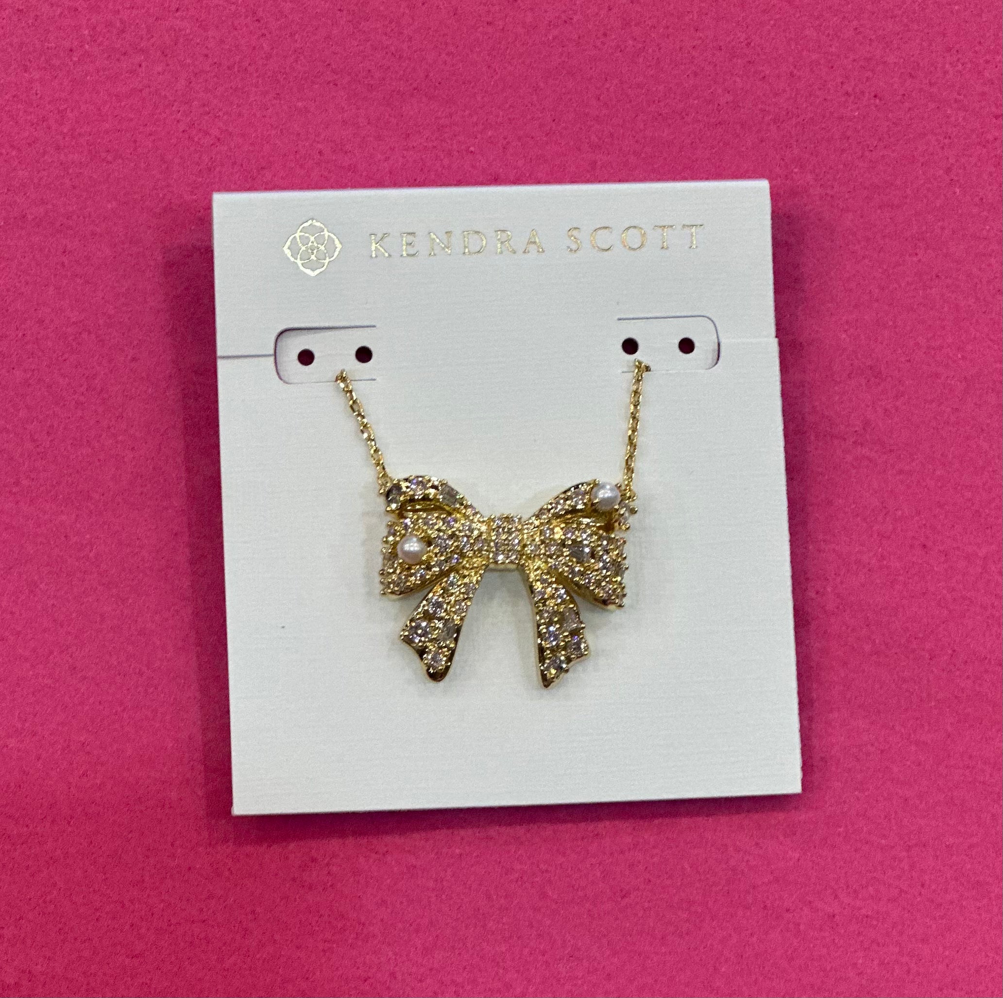 Krista Bow Pendant Necklace Gold White Mix
